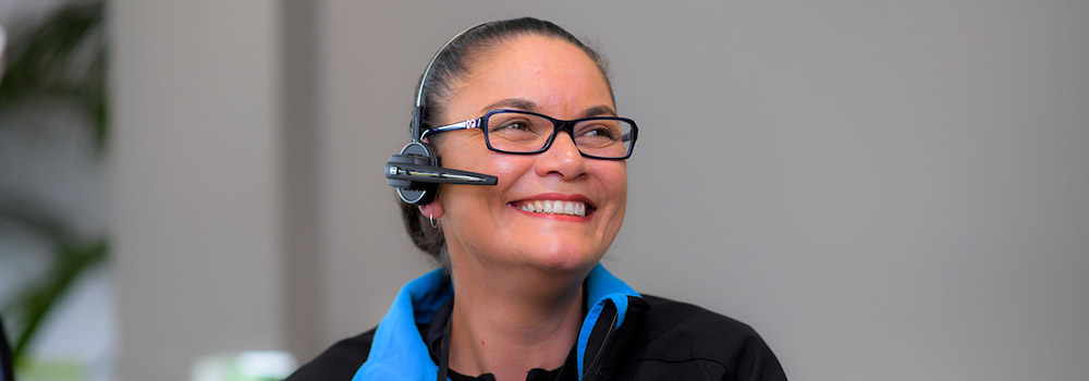 Regional Council customer service operator smiling